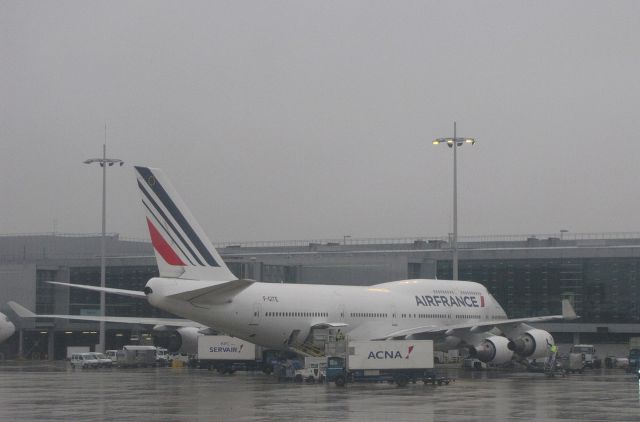 Boeing 747-400 (F-GITE) - In pouring rain at Paris/Charles-de-Gaulle