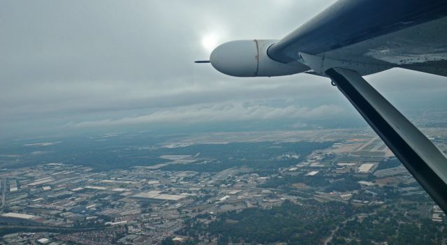 — — - Off to Destin FL with a view of Memphis International below.