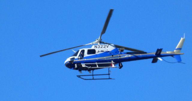 Eurocopter AS-350 AStar (N322V) - Making a low pass is this 2019 Airbus Eurocopter A350B3 rotorcraft in the Autumn of 2021.