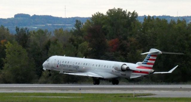 Canadair Regional Jet CRJ-900 (N588NN) - Departing the active runway is this 2016 American Airlines Eagle Canadair Regional Jet 900 in the Autumn of 2020.