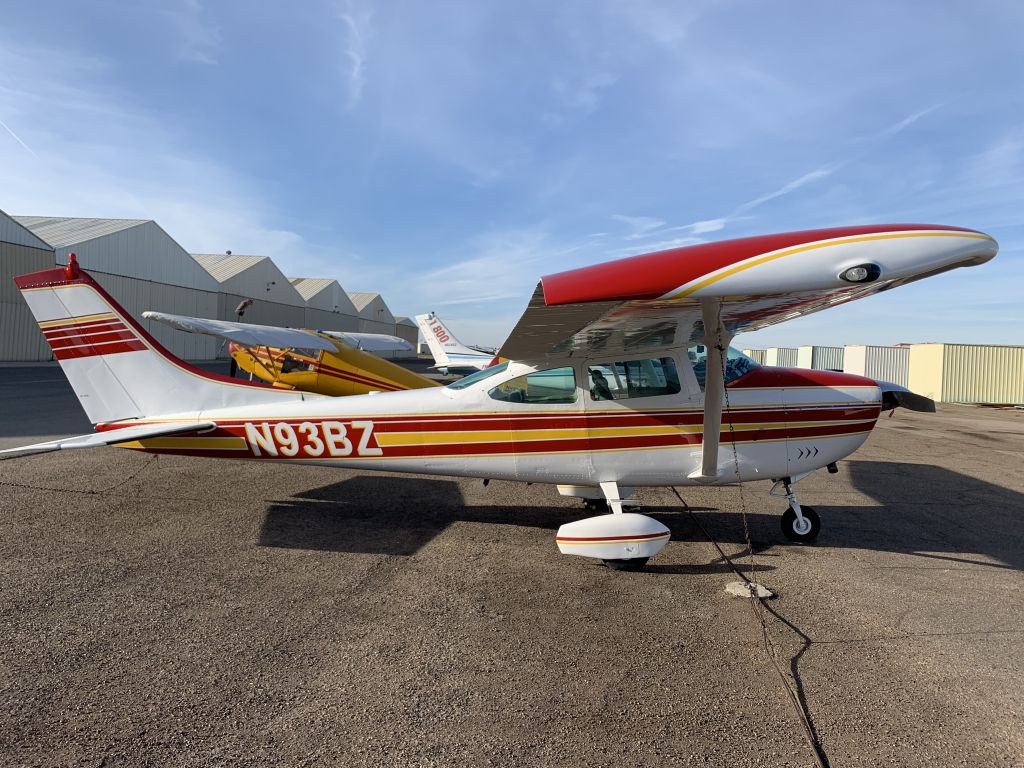 Cessna Skylane (N93BZ) - N93BZ: White body with scarlet and gold trim. 