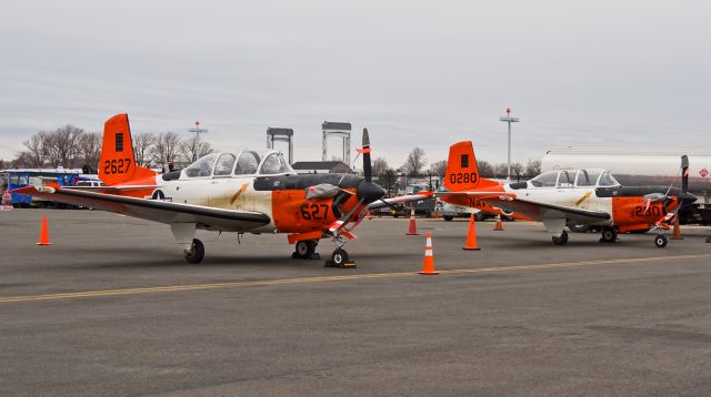 — — - US Navy T34 trainers @ KBOS Logan Airport !