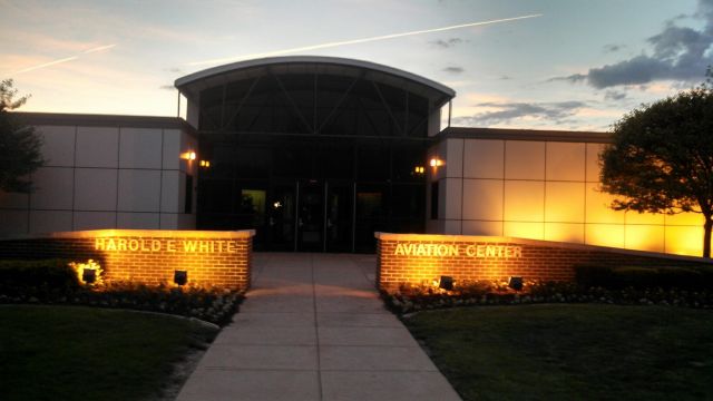 — — - The entrance of the Harold White Aviation building at Lewis University. This building is the gateway from the Lewis University campus onto the Lewis University Airport.