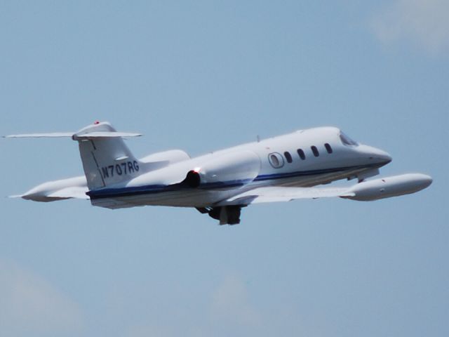 Learjet 35 (N707RG) - GORDON AIR LLC (NASCAR driver Robbie Gordon) departing runway 20 at KJQF - 7/22/09