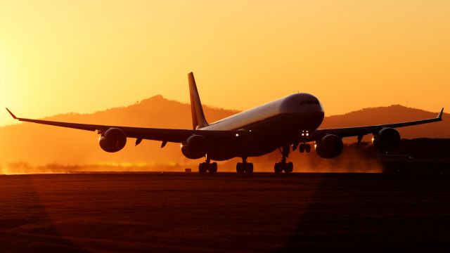 Airbus A340-600 (EC-IZX) - Taking off from runway 07 on a perfect afternoon! Starting its 10-11 hour journey back to MAD.