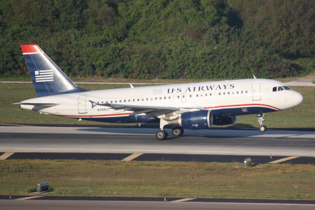 Airbus A319 (N749US) - US Air Flight 1680 (N749US) departs Runway 1L at Tampa International Airport enroute to Regan National Airport