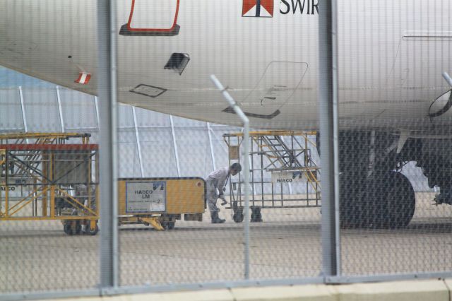 Airbus A321 (B-HSM) - A heaco Staff is checking the Aircraft.