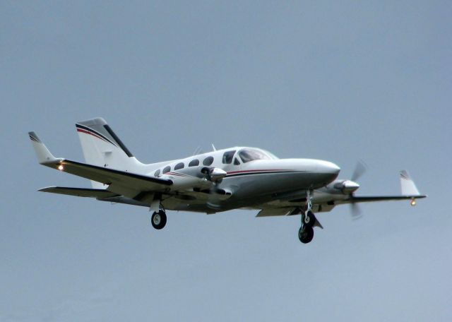 Cessna Chancellor (N91TW) - Landing on 05 at Shreveport Regional. A rainy, overcast day!