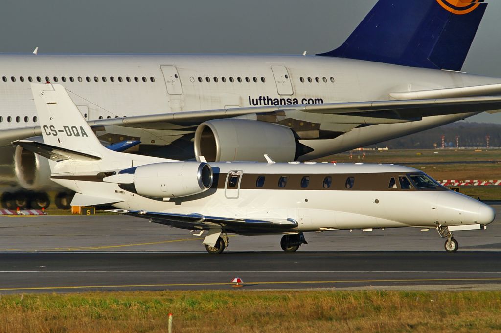 Cessna Citation Excel/XLS (CS-DQA) - photo taken 20-Mar-2014, line-up RWY18, while a Lufthansa A380 is being towed in the backdrop, late afternoon light