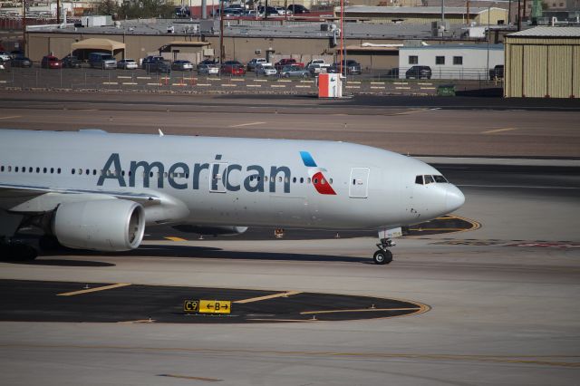 Boeing 777-200 (N776AN) - Taken from T4 Parking Garage. Diverted from LAX.