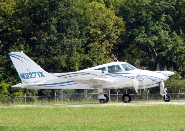 Cessna 310 (N3271X) - Rolling for take off on 14 at Downtown Shreveport.