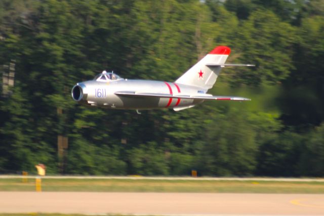 MIKOYAN MiG-17 (NX217SH) - The "Low Show" at Oshkosh .......br /Demo put on by Randy Ball.