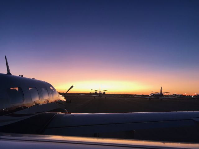 Piper Malibu Mirage (C-GHVM) - Sunset at the Spokane airport