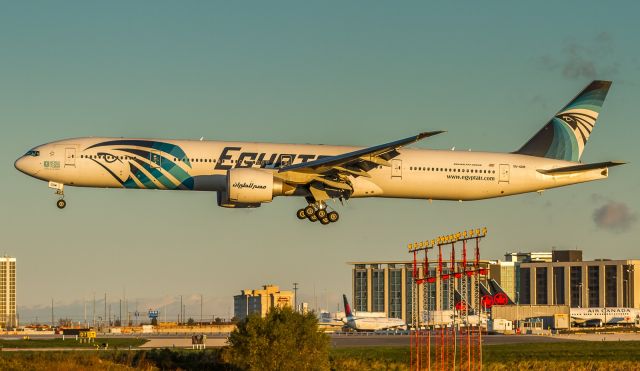 BOEING 777-300ER (SU-GDM) - MSR995 about to touch down on runway 24R at sunrise on a gorgeous Fall morning at YYZ