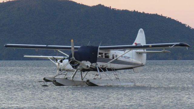 De Havilland Canada DHC-3 Otter (ZK-VAS) - With Volcanicair's other floatplane FEO on the lake.