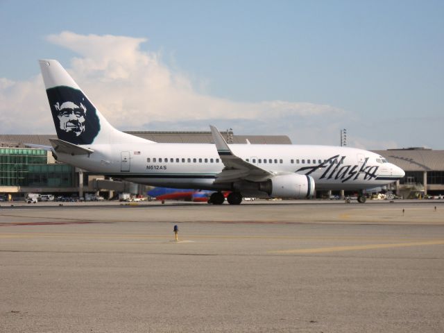 Boeing 737-700 (N612AS) - Holding on RWY 19R