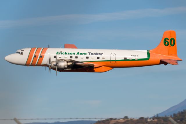 Douglas DC-7 (N838D) - Departing Medford back to Madras after completing their final season of fire fighting.