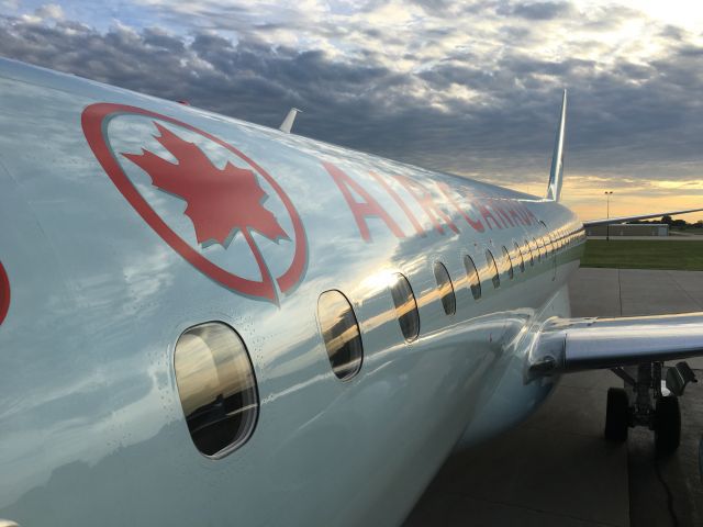 Embraer 175 — - Sunset on fuselage