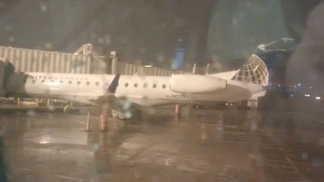 Embraer ERJ-145 (N21197) - Snowing in Cleveland. (in April...)