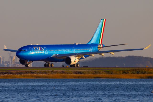 Airbus A330-300 (EI-EJL) - Golden hour from Constitution Beach.