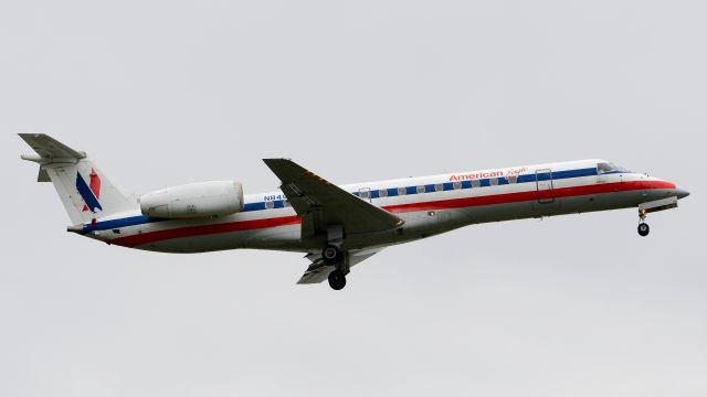 Embraer ERJ-135 (N849AE) - Landing on 27R at Philly, still in the 90s colors. Likely wont see one of these again. 5/28/2018