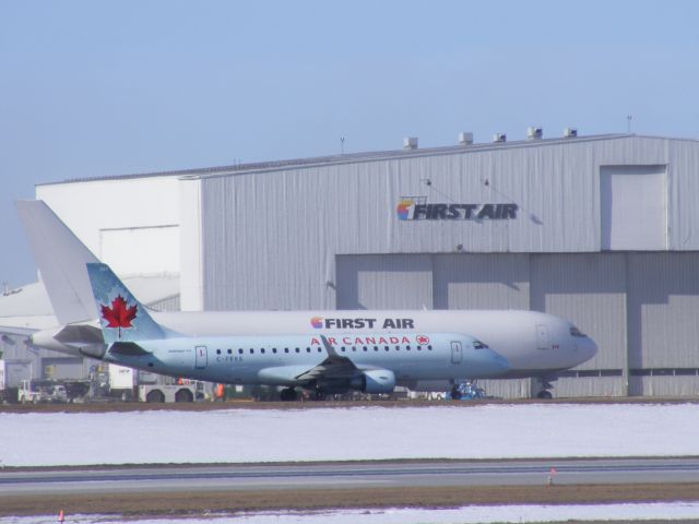 Embraer ERJ 175 (C-FEKS) - Embraer posing beside First Air 767.