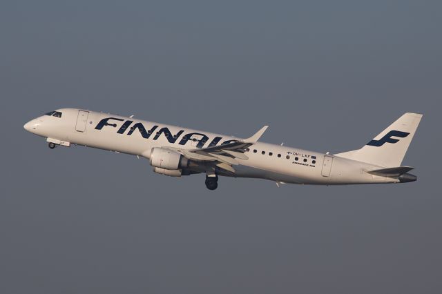 Embraer ERJ-190 (OH-LKF) - A regular visitor to Manchester, OH-LKF departs to Helsinki as FIN934 leaving the fog behind.