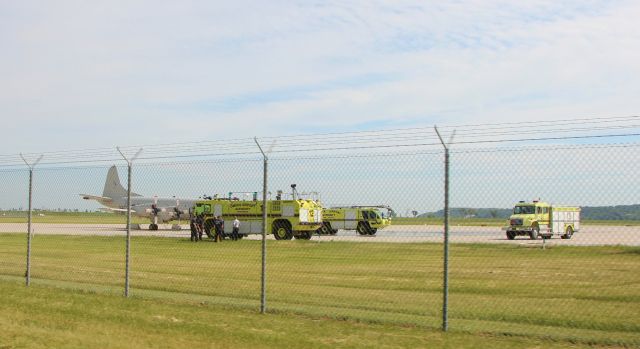 — — - 5/29/18 Eppley ARFF crews and Orion P3C on the north transient ramp