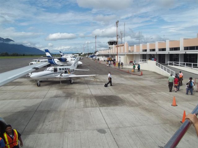 — — - La Ceiba Airport Ramp.