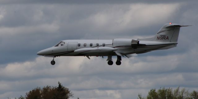 Learjet 35 (N9RA) - On final is this 1989 Learjet 35A in the Spring of 2020.
