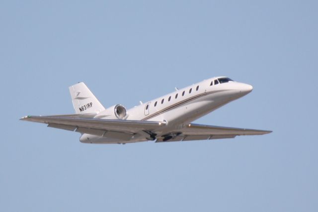 Cessna Citation Sovereign (N631RP) - N631RP departs Runway 14 at Sarasota-Bradenton International Airport