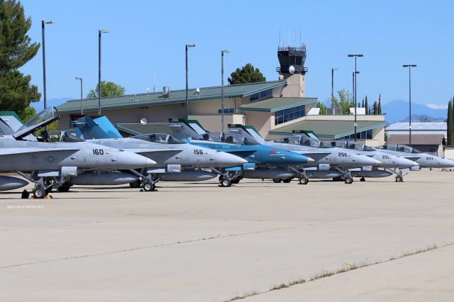 McDonnell Douglas FA-18 Hornet (16-4227) - KRDD - 6-USMC Miramar VMFAT-101 "Sharpshooters" F/A-18s on the ramp at Redding,CA for a weekend training segment, though 2 ships here launched 4/21/2018 for the training flight and flyover of the opening ceremonies at the Red Bluff Roundup 2018. Ships #160 is 16-4227,Ship #243 were nice and loud. These ships lacked the usual officer name and nickname, except 2. ("Landfill" far right) and ("Mongo" 2nd from left).