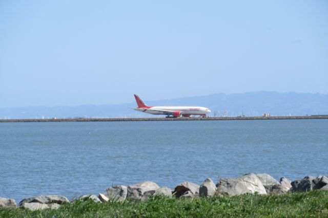 BOEING 777-300ER — - Air India 777 at SFO, taxiing for departure on runway 28R.