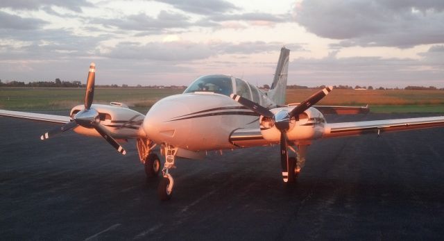 Beechcraft 55 Baron (N1832W) - Sun is setting in the west on this E-55 with TKS.