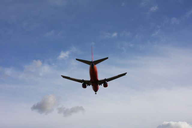 Boeing 737-700 — - A Southwest plane landing at KSMF on runway 16L.