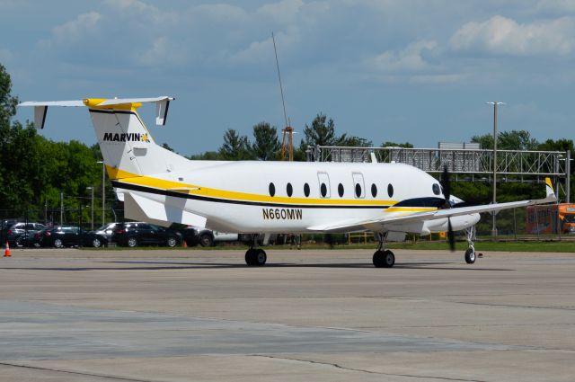 Beechcraft 1900 (N660MW) - A Beechcraft 1900D owned and operated by MARVIN Lumber and Cedar Co, mostly known for making doors and windows, is taxing onto Signature Aviation's Ramp at DSM after a flight from Warroad, Minnesota. Photo taken June 3, 2021 at 3:11 PM with Nikon D3200 at 100mm.