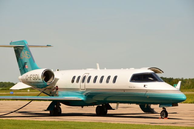 Bombardier Learjet 75 (C-FSDL) - Quick re-fuel at CYQV. 