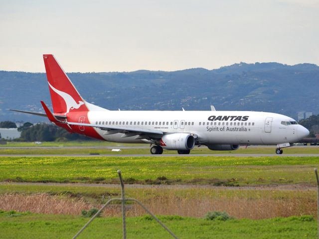 Boeing 737-800 (VH-VYB) - On taxi-way heading for take off on runway 05. Thursday, 12th July 2012.