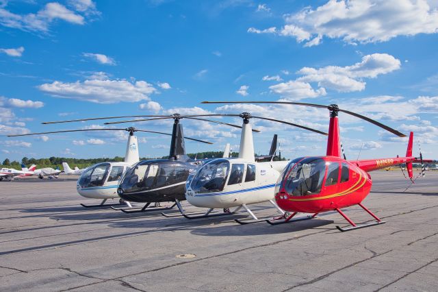 Robinson R-44 — - Flock of Robinson Helicopters.