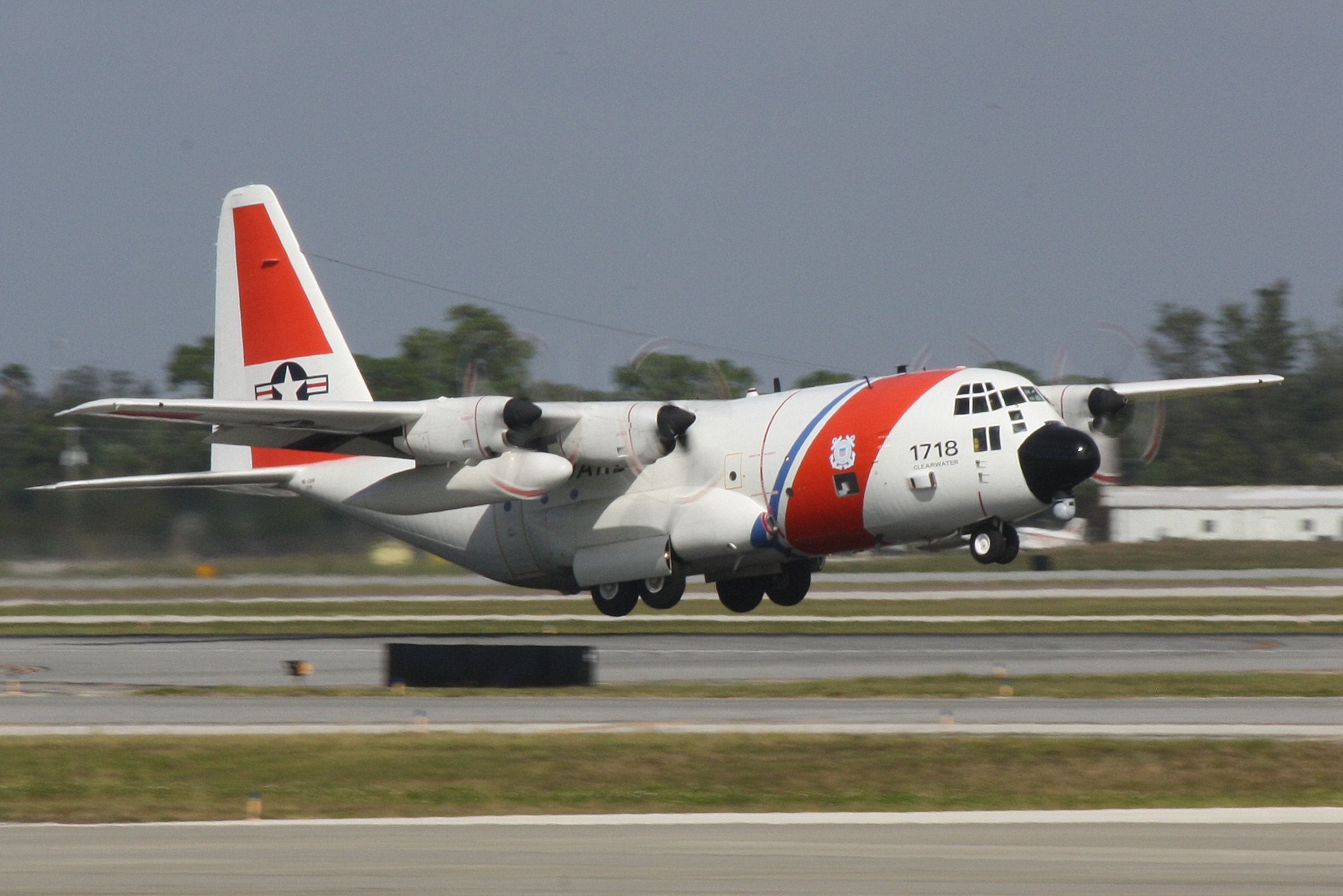 Lockheed C-130 Hercules — - US Coast Guard HC-130 Hercules (1718) from Air Station Clearwater departs Sarasota-Bradenton International Airport