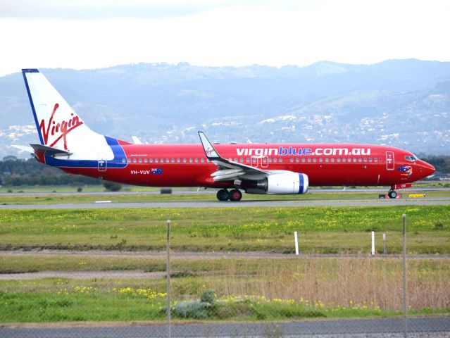 Boeing 737-800 (VH-VUV) - On taxi-way heading for take off on runway 05. Thursday 12th July 2012.