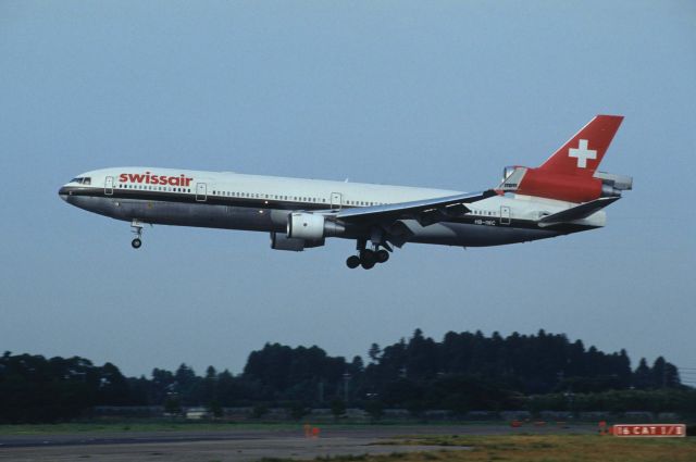 Boeing MD-11 (HB-IWC) - Short Final at Narita Intl Airport Rwy16R on 1995/08/26