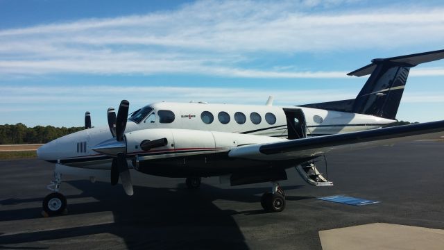 Beechcraft Super King Air 200 (N25WC) - Parked in front of Destin Jet FBO.