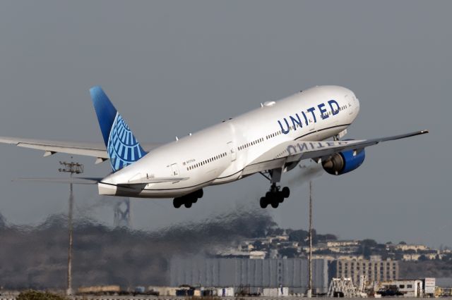 Boeing 777-200 (N775UA) - 16th November, 2024: Taking off from runway 01R. Parts of the Bay Bridge are visible in the background. 