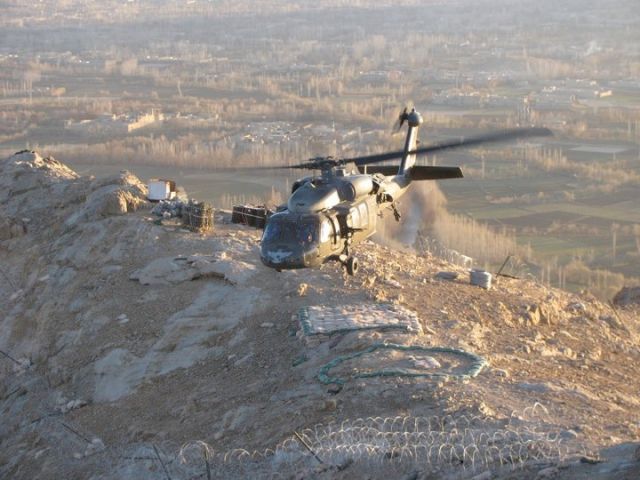 — — - UH-60 taking off after delivering Thanksgiving Dinner to troops in Afghanistan.