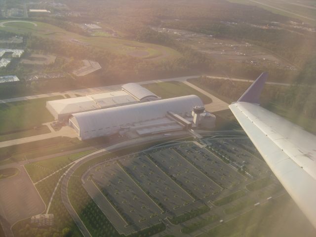 Canadair Regional Jet CRJ-700 (N719SK) - After taking off runway 19L, sorry for quality. However, the Udvar Hazy Center can be seen nicely.