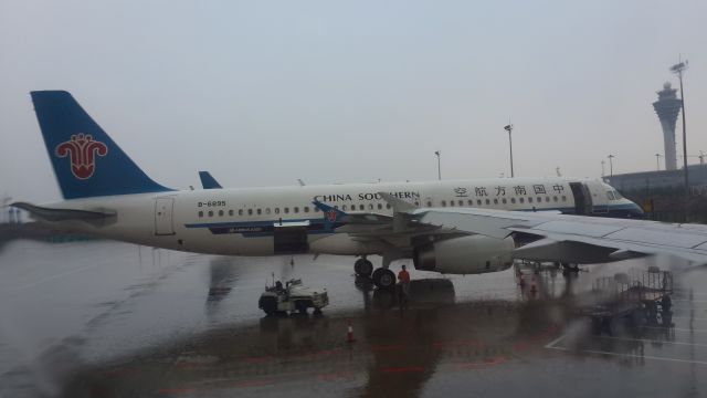 B-6895 — - After 10 minutes of rain at Guangzhou...