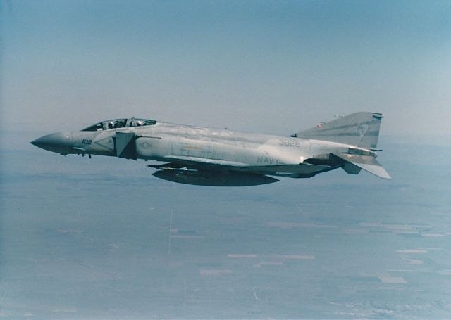 McDonnell Douglas F-4 Phantom 2 (15-3828) - A close up of a F-4S of VA-201 on the right side of a KC-10 waiting for his wing man to finish refueling over eastern New Mexico fall of 1985. Modex AF102