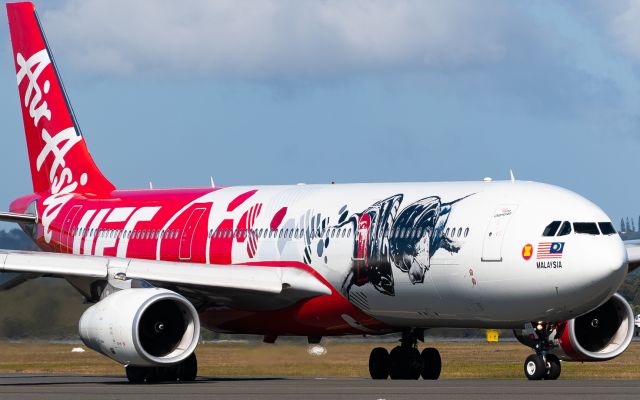 Airbus A330-300 (9M-XXD) - 9M-XXD (UFC livery) taxiing to RWY14 via Charlie at Gold Coast Airport.