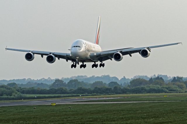 Airbus A380-800 (A6-EOY) - Evening arrival for one of the high density Emirates A380s.  UAE19 just before landing on 05R at Manchester.